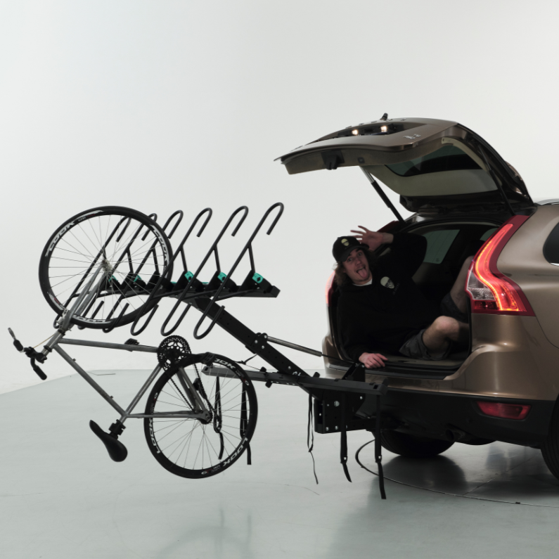 Back of brown SUV, open trunk, Jameson inside, JB Rack 6 Bike Rack installed