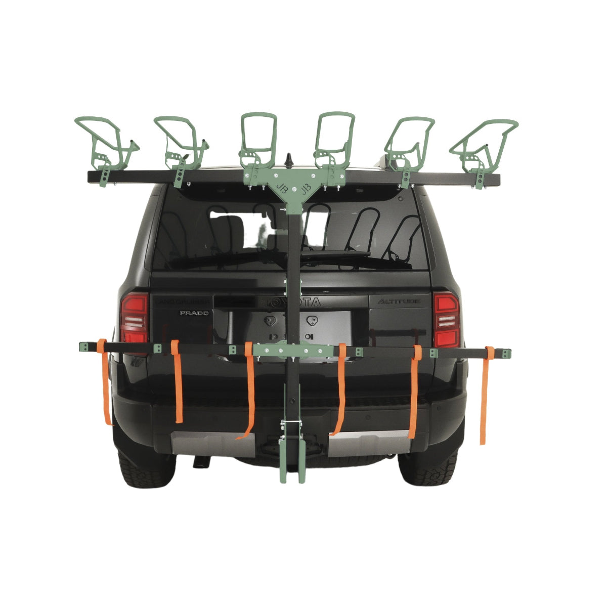 Car roof rack system on a black SUV with green crossbars and orange straps.