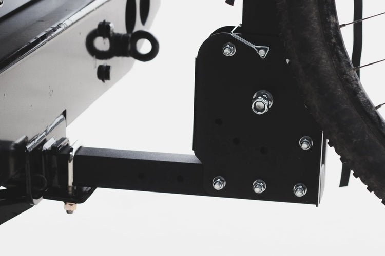 Anti-wobble hitch bracket tightened into a hitch receiver