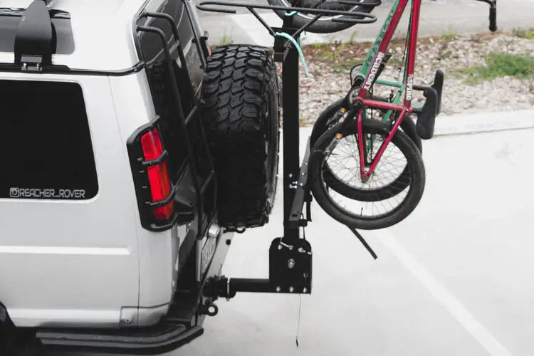 Side view of JB Racks 450mm hitch bar clearing a rear-mounted spare wheel
